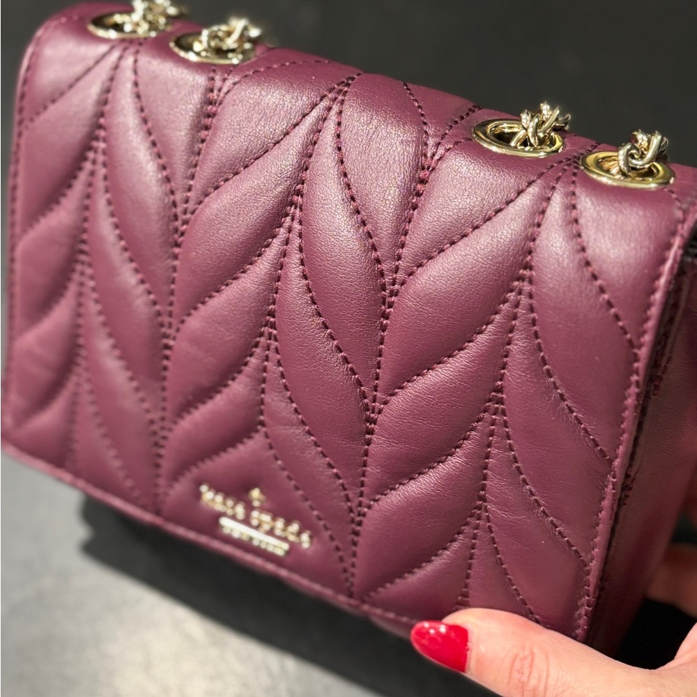 Like new plum Kate Spade chain strap purse